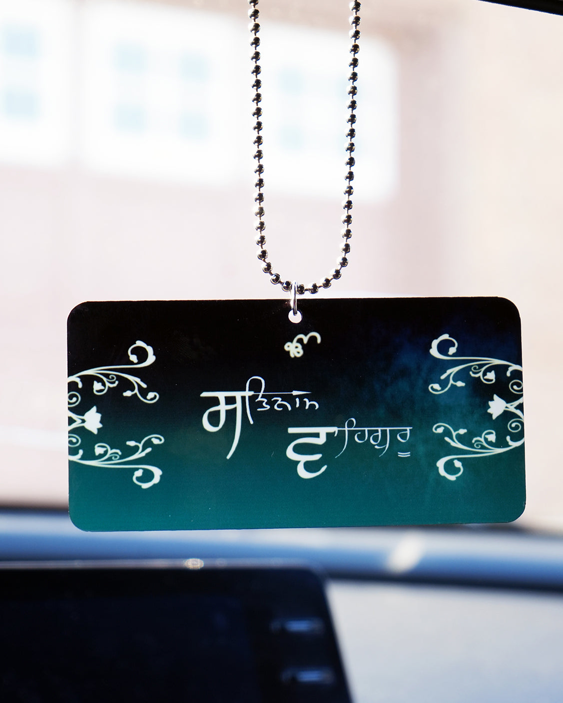 Satnam Waheguru car hanging